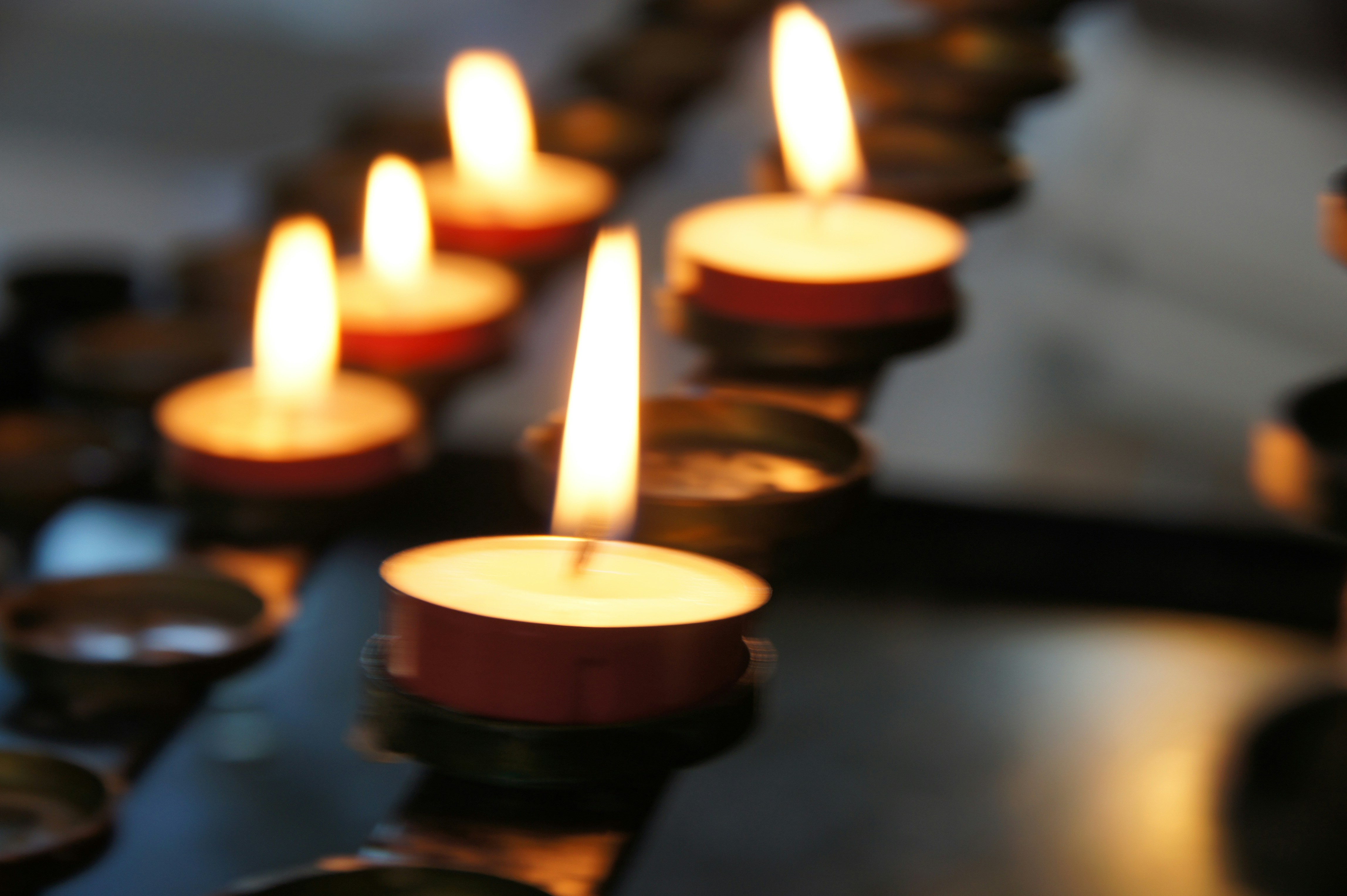 Soft candlelight creating a quiet, reflective atmosphere